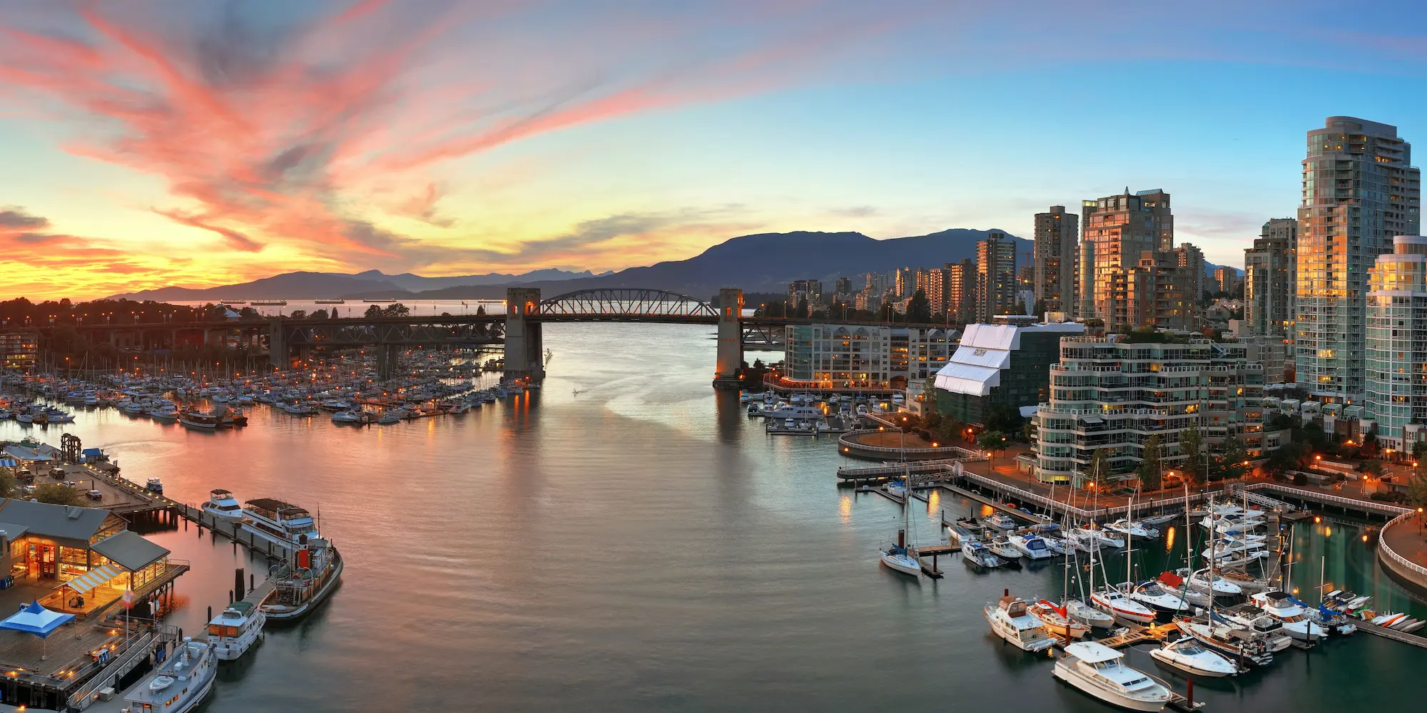 Sunset shining down on beautiful yachts around Vancouver BC